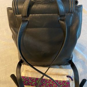 Gently used Tori Burch Black Backpack with storage bag included